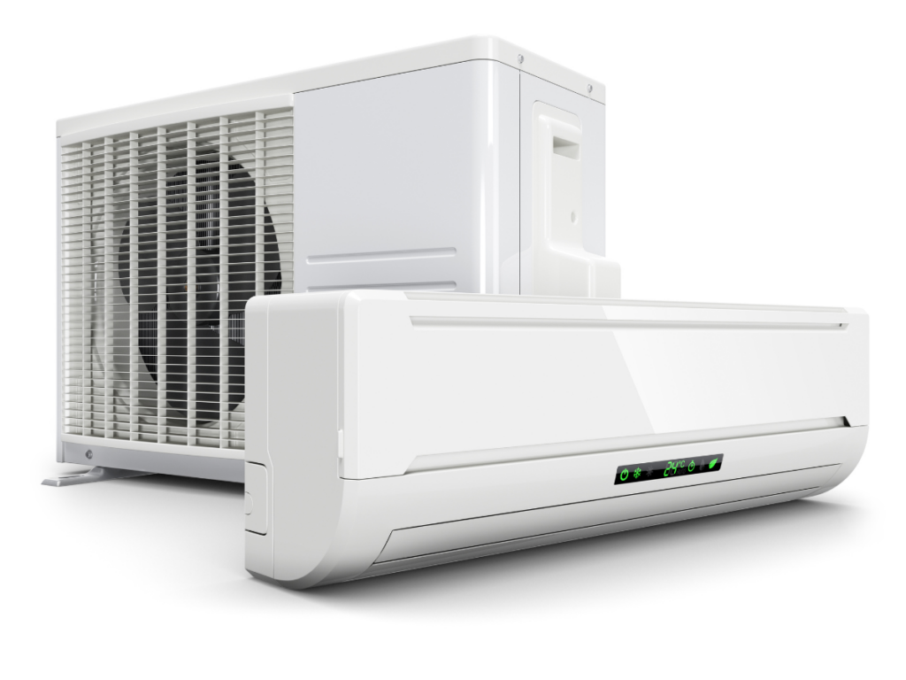 A white split-system air conditioner with an indoor unit in the foreground and an outdoor unit with a visible fan in the background offers efficient cooling and can be an excellent alternative to traditional furnace replacement.